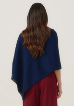 Load image into Gallery viewer, Possum and Merino

1623 Two Tone Poncho - A fan favourite, the Two Tone Poncho is a winner. With a relaxed fit and contrast coloured tipping it&#39;s cut for comfort and style. With a rainbow of colour options on offer, this is one you&#39;ll want in each colour! Classic fit.&nbsp;

Made in New Zealand from an exclusive Merinomink blend of 50% ZQ Merino, 40% Brushtail possum and 10% Mulberry silk.