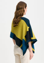 Load image into Gallery viewer, Possum and Merino

1677 Empress Poncho - The Empress should have been called impress, as you&#39;ll be sure to turn heads in this one! With its bold colour blocking and timeless design, the Empress Poncho is statement piece you&#39;ll love.

Made in New Zealand from an exclusive Merinomink blend of 50% ZQ Merino, 40% Brushtail possum and 10% Mulberry silk.