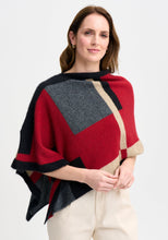 Load image into Gallery viewer, Possum and Merino

1677 Empress Poncho - The Empress should have been called impress, as you&#39;ll be sure to turn heads in this one! With its bold colour blocking and timeless design, the Empress Poncho is statement piece you&#39;ll love.

Made in New Zealand from an exclusive Merinomink blend of 50% ZQ Merino, 40% Brushtail possum and 10% Mulberry silk.