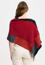 Load image into Gallery viewer, Possum and Merino

1677 Empress Poncho - The Empress should have been called impress, as you&#39;ll be sure to turn heads in this one! With its bold colour blocking and timeless design, the Empress Poncho is statement piece you&#39;ll love.

Made in New Zealand from an exclusive Merinomink blend of 50% ZQ Merino, 40% Brushtail possum and 10% Mulberry silk.