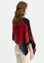 Load image into Gallery viewer, Possum and Merino

1677 Empress Poncho - The Empress should have been called impress, as you&#39;ll be sure to turn heads in this one! With its bold colour blocking and timeless design, the Empress Poncho is statement piece you&#39;ll love.

Made in New Zealand from an exclusive Merinomink blend of 50% ZQ Merino, 40% Brushtail possum and 10% Mulberry silk.