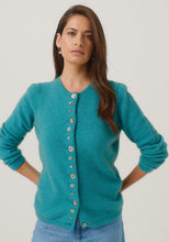 Load image into Gallery viewer, Possum and Merino

1736 Shell Cardi - Our signature Shell Cardi is a Merinomink staple, loved for its simple lines and statement buttons. A fitted silhouette offers a smart and refined look that can dress and up and down with ease. Slim fit.&nbsp;

Made in New Zealand from an exclusive Merinomink blend of 50% ZQ Merino, 40% Brushtail possum and 10% Mulberry silk.