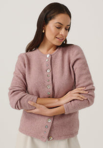 Possum and Merino

1736 Shell Cardi - Our signature Shell Cardi is a Merinomink staple, loved for its simple lines and statement buttons. A fitted silhouette offers a smart and refined look that can dress and up and down with ease. Slim fit.&nbsp;

Made in New Zealand from an exclusive Merinomink blend of 50% ZQ Merino, 40% Brushtail possum and 10% Mulberry silk.