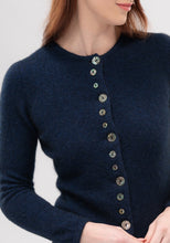 Load image into Gallery viewer, Possum and Merino  1736 Shell Cardigan -  An endearing little cardi inspired by our love of New Zealand. The natural paua shell buttons take on the hue of the knit, and with most of the buttons being decorative, it&#39;s easy to get on and off! 