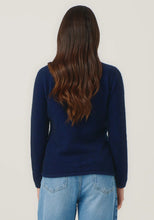 Load image into Gallery viewer, Possum and Merino

1736 Shell Cardi - Our signature Shell Cardi is a Merinomink staple, loved for its simple lines and statement buttons. A fitted silhouette offers a smart and refined look that can dress and up and down with ease. Slim fit.&nbsp;

Made in New Zealand from an exclusive Merinomink blend of 50% ZQ Merino, 40% Brushtail possum and 10% Mulberry silk.