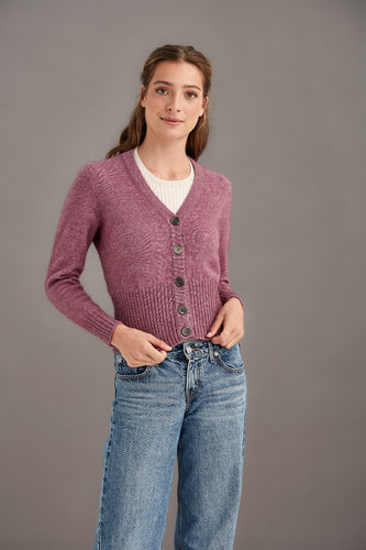 Possum and Merino  5034 Rib Cardi is knitted using our carefully sourced Natural Fibre blend of Possum Fur, Merino Wool and Mulberry Silk and finished with feature Shell Buttons, our Possum Merino Rib Cardi is a gorgeous take on a classic cardigan.  Rib detailing on the sleeve and hem partnered with a Deep V Neckline help to create a timeless, tailored look.
