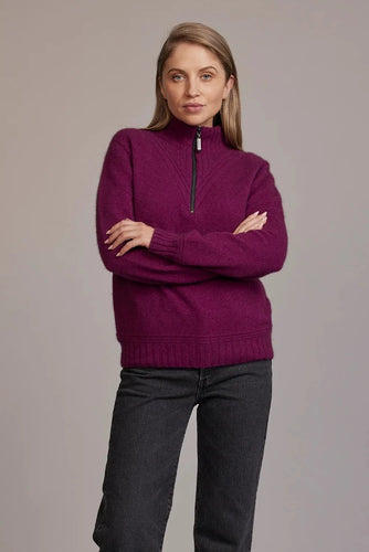 Possum and Merino  5040 Ridge Funnel Neck – A beautiful sweater made from the ultimate combination of natural fibres for warmth without weight.  Featuring ridge patter neck detailing and ¼ zip for ease of wear.  ¼ zip and high collar Feature rib knit on neck Mid-weight warmth 35% Possum Fur, 55% Merino Wool, 10% Pure Mulberry Silk New Zealand designed and manufactured