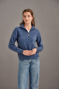 Possum and Merino  5040 Ridge Funnel Neck – A beautiful sweater made from the ultimate combination of natural fibres for warmth without weight.  Featuring ridge patter neck detailing and ¼ zip for ease of wear.  ¼ zip and high collar Feature rib knit on neck Mid-weight warmth 35% Possum Fur, 55% Merino Wool, 10% Pure Mulberry Silk New Zealand designed and manufactured