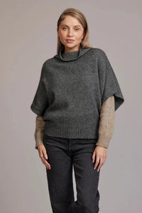 Possum and Merino  5043 Shrug Sweater – This Shrug Sweater impresses with its form and function, artfully draping on the body while keeping you exceptionally warm.  Natural wool and possum fibres combine with delicate mulberry silk to create a forever knit you will cherish for years to come.  Shrug style short sleeve sweater Lightweight warmth 35% Possum Fur, 55% Merino Wool, 10% Pure Mulberry Silk New Zealand designed and manufactured