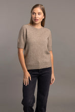 Load image into Gallery viewer, Possum and Merino

5052 Stepped Stitch T-Shirt - An everyday essential which features a unique stepped stitch design finish at the cuffs and hem. Crafted from soft, breathable natural fibres, it’s perfect for effortless layering or as a standalone statement piece. Versatile and comfortable, this T-shirt transitions seamlessly from casual wear to more polished looks.

35% Possum Fur, 55% Merino Wool, 10% Pure Mulberry Silk
New Zealand designed and manufactured
Natural and Sustainable