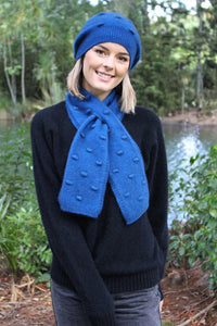 Possum and Merino   9721 Bobble Keyhole Scarf - Featuring a textured bobble knit this compact scarf is an easy wear option - simply draw the tail of the scarf up through the knitted slot.  One size only - Approx. 108cm long x 16cm wide.   Made in New Zealand from a premium blend of 40% possum fur, 50% merino & 10% nylon.