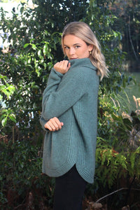 Possum and Merino.  9784 Stratus Cowl Neck Jumper - This feminine take on the chunky fisherman's rib jumper features a generous cowl neck and flattering curved hemline.   Made in New Zealand from a premium blend of 40% possum fur, 50% merino & 10% nylon.