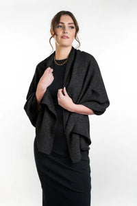 Possum and Merino  KO518  Lightweight Moss Stitch Wrap - This moss stitch wrap is lightweight, yet extremely warm to wear. It can also be worn as an over sized scarf on those extra chilly days.  One size only.  Approx. 63cm wide x 170cm long.  Made proudly in New Zealand from a premium blend of 40% possum fur, 50% merino lambswool & 10% mulberry silk.  
