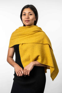 Possum and Merino  KO518  Lightweight Moss Stitch Wrap - This moss stitch wrap is lightweight, yet extremely warm to wear. It can also be worn as an over sized scarf on those extra chilly days.  One size only.  Approx. 63cm wide x 170cm long.  Made proudly in New Zealand from a premium blend of 40% possum fur, 50% merino lambswool & 10% mulberry silk.  