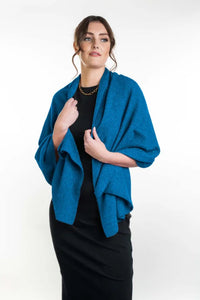 Possum and Merino  KO518  Lightweight Moss Stitch Wrap - This moss stitch wrap is lightweight, yet extremely warm to wear. It can also be worn as an over sized scarf on those extra chilly days.  One size only.  Approx. 63cm wide x 170cm long.  Made proudly in New Zealand from a premium blend of 40% possum fur, 50% merino lambswool & 10% mulberry silk.  