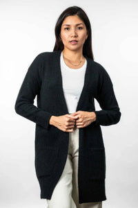 Possum and Merino KO544 Long Line Cardigan -A longline cardigan that is a great throw over style which makes it perfect to keep you feeling warm and snug.  It has ribbed cuffs and hem and is finished with patch pockets.  Made proudly in New Zealand from a premium blend of 40% possum fur, 50% merino lambswool & 10% mulberry silk.