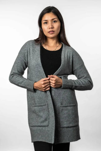 Possum and Merino KO544 Long Line Cardigan -A longline cardigan that is a great throw over style which makes it perfect to keep you feeling warm and snug.  It has ribbed cuffs and hem and is finished with patch pockets.  Made proudly in New Zealand from a premium blend of 40% possum fur, 50% merino lambswool & 10% mulberry silk.