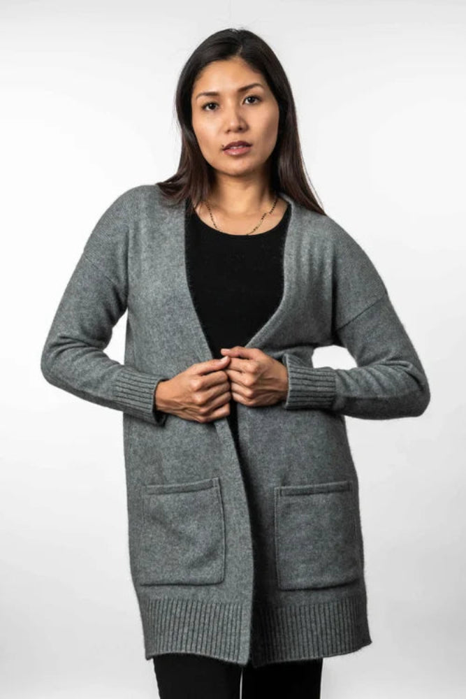 Possum and Merino KO544 Long Line Cardigan -A longline cardigan that is a great throw over style which makes it perfect to keep you feeling warm and snug.  It has ribbed cuffs and hem and is finished with patch pockets.  Made proudly in New Zealand from a premium blend of 40% possum fur, 50% merino lambswool & 10% mulberry silk.