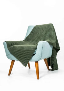 Possum and Merino  KO91 Ribbed Throw - Luxurious, generously sized throw in a chunky ribbed knit.  One size - Approx\.  140cm x 180cm  Made proudly in New Zealand from a premium blend of 40% possum fur, 50% merino lambswool & 10% mulberry silk. 