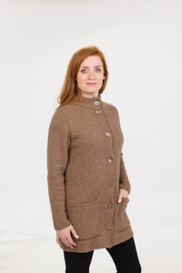 Possum and Merino  NS869 Essential Coat – This coat features a longer length, knit roll pockets, and shell buttons with traditional closure - a wardrobe classic   Fitting Style – Regular fit - A classic, standard fit.   Yarn: Essential Blend - 30% Possum fibre, 60% Superfine Merino wool (17.5 Micron), 10% Silk