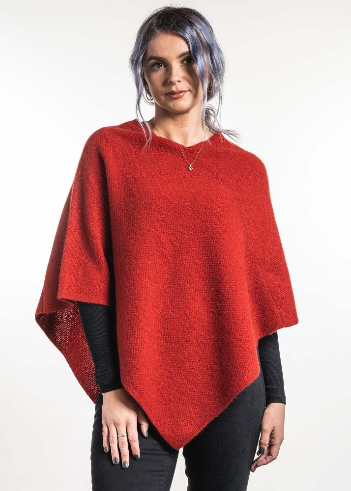 Possum and Merino  TR1022 Moss Stitch Poncho - This moss stitch poncho can be worn two different ways, with the hem straight across or on a diagonal.  One size only