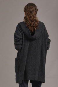 5013 Oversize Hood Jacket - Heavenly warmth and comfort, our Oversized Hood Jacket is ticking all the right boxes to become your new favourite overpiece of the season.  Mid weight Oversized Hood Two Front Pockets 35% Possum Fur, 55% Merino Wool, 10% Pure Mulberry Silk New Zealand designed and manufactured Generous Fit Natural and Sustainable 