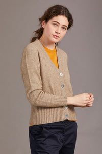 Possum and Merino  5034 Rib Cardi is knitted using our carefully sourced Natural Fibre blend of Possum Fur, Merino Wool and Mulberry Silk and finished with feature Shell Buttons, our Possum Merino Rib Cardi is a gorgeous take on a classic cardigan.  Rib detailing on the sleeve and hem partnered with a Deep V Neckline help to create a timeless, tailored look.