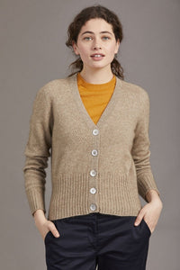 Possum and Merino  5034 Rib Cardi is knitted using our carefully sourced Natural Fibre blend of Possum Fur, Merino Wool and Mulberry Silk and finished with feature Shell Buttons, our Possum Merino Rib Cardi is a gorgeous take on a classic cardigan.  Rib detailing on the sleeve and hem partnered with a Deep V Neckline help to create a timeless, tailored look.