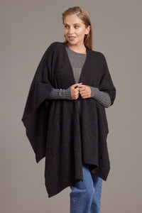 616 Split Front Cape - This cape blurs the line between art-piece and clothing.  It impresses with its form and function, artfully draping on the body while keeping you exceptionally warm.  The merino and possum fibres combine with delicate mulberry silk to create something superb - warmth, sophistication and beauty.  Size: approximately 80 cm x 102 cm.
