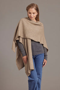 616 Split Front Cape - This cape blurs the line between art-piece and clothing.  It impresses with its form and function, artfully draping on the body while keeping you exceptionally warm.  The merino and possum fibres combine with delicate mulberry silk to create something superb - warmth, sophistication and beauty.  Size: approximately 80 cm x 102 cm.