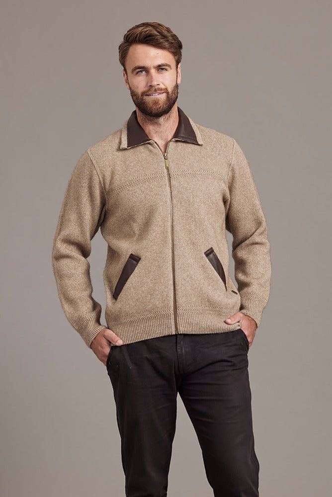 649 Lambskin Collar Jacket - A classic jacket to rule them all.  A masterpiece of workmanship that combines New Zealand Merino wool, Possum fur with Mulberry Silk and high quality lambskin into luxury.  The lambskin collar and pockets sit beautifully among a rack-stitch knit at the front and a
