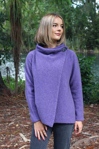 Possum and Merino  9780 Enfold Jacket - This cosy jacket fastens with a cross over front that buttons either side of the shoulder.  The front can be draped when worn open.  This garment is knitted sideways and runs up to 3XL size.
