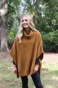 9768 Lush Cowl Neck Poncho - Generous sized textured cowl neck poncho with rib detailing around the edges.  This poncho is joined at the sides for a relaxed fit.  Length - 69cm (from centre back of neck to hem.