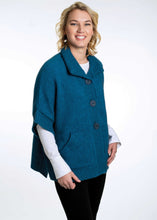 Load image into Gallery viewer, Possum and Merino  KO552 Cape with Pockets - An easy to wear piece which features ribbed trims, knitted-in pockets and beautiful textured buttons.  This garment is ideal for layering and is a relaxed fit.  Made proudly in New Zealand from a premium blend of 40% possum fur, 50% merino lambswool &amp; 10% mulberry silk.  