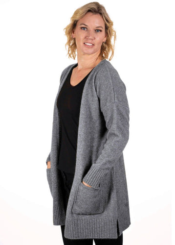 Possum and Merino KO544 Long Line Cardigan -A longline cardigan that is a great throw over style which makes it perfect to keep you feeling warm and snug.  It has ribbed cuffs and hem and is finished with patch pockets.  Made proudly in New Zealand from a premium blend of 40% possum fur, 50% merino lambswool & 10% mulberry silk.