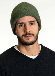Possum and Merino  KO159 Plain Beanie - A plain, double layer beanie with a turned back edge and metal Koru badge.  Makes a set with KO114 Scarf with Fringe and KO48 Plain Gloves.   One Size.  Made proudly in New Zealand from a premium blend of 40% possum fur, 50% merino lambswool & 10% mulberry silk. 