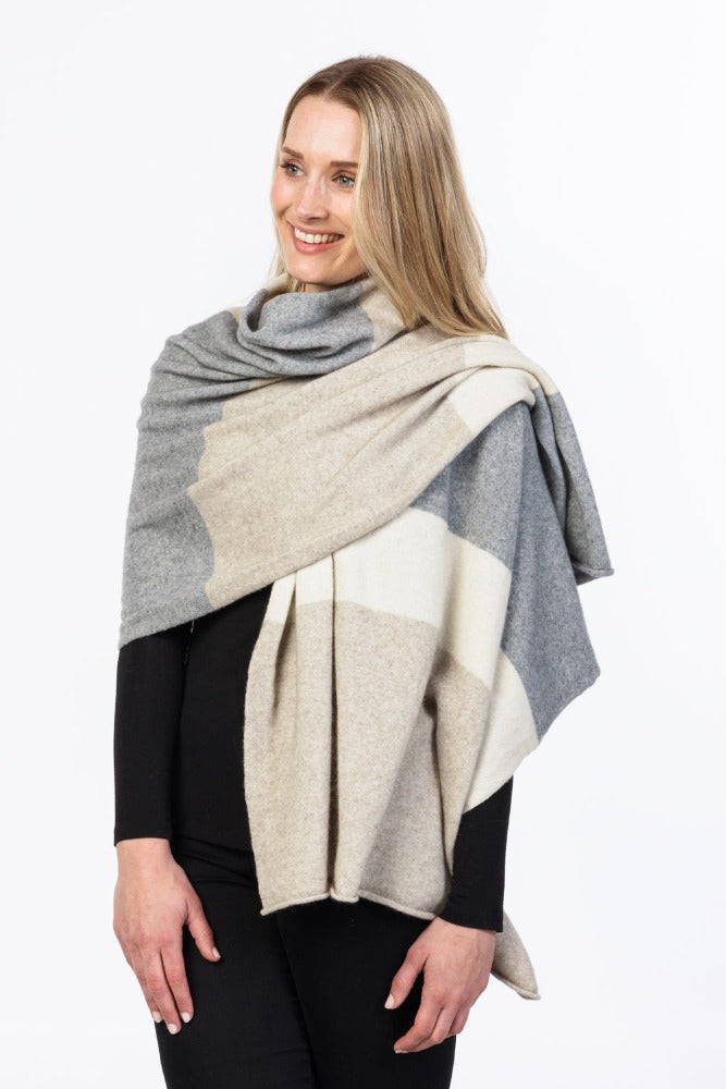 Possum and Merino.  NE815 Travel Wrap - This wrap is elegant and stylish, and can be worn in a multiple ways.  The ultimate travel companion.