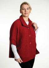 Load image into Gallery viewer, Possum and Merino  KO552 Cape with Pockets - An easy to wear piece which features ribbed trims, knitted-in pockets and beautiful textured buttons.  This garment is ideal for layering and is a relaxed fit.  Made proudly in New Zealand from a premium blend of 40% possum fur, 50% merino lambswool &amp; 10% mulberry silk.  